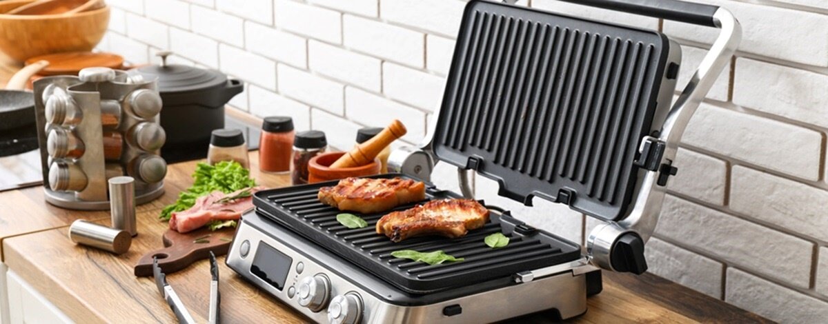 grill elektryczny z wymiennymi płytkami
