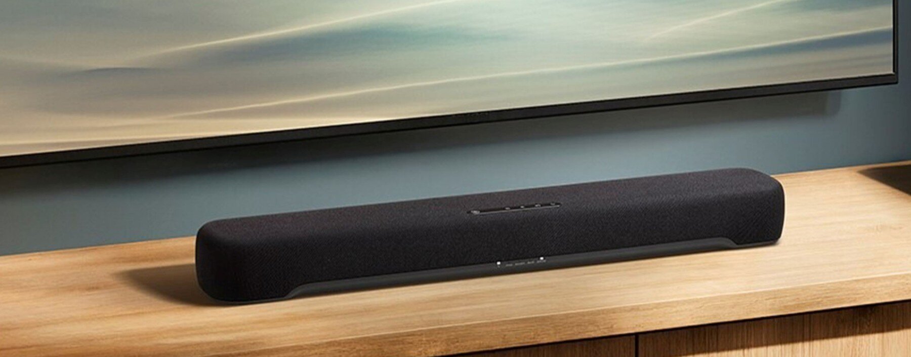 Yamaha B200A to soundbar dla tych, którzy nie mają miejsca na kino domowe Ten soundbar ma tylko 60 cm. Yamaha upchnęła w nim Dolby Atmos i subwoofer